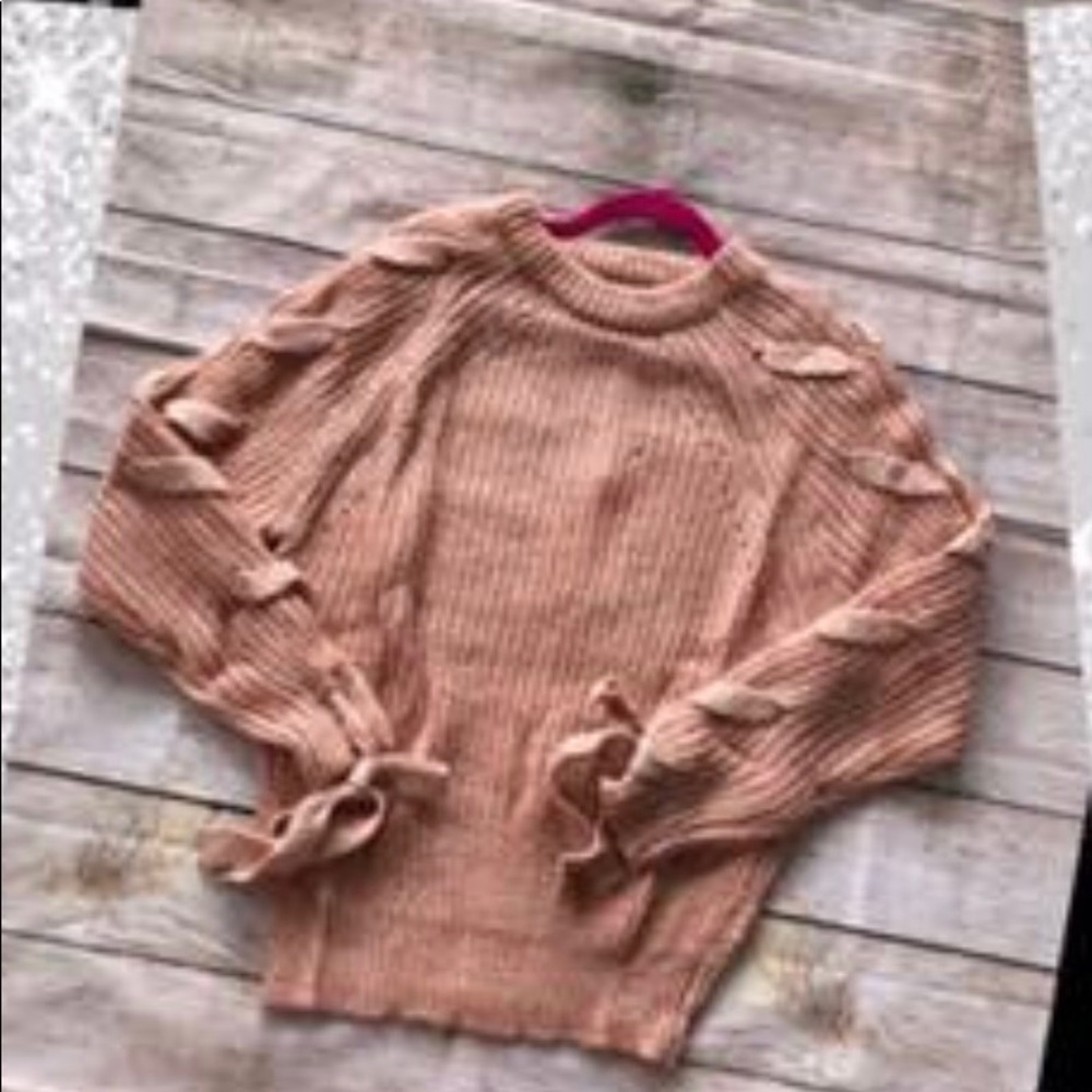 Boutique lace up sleeve sweater